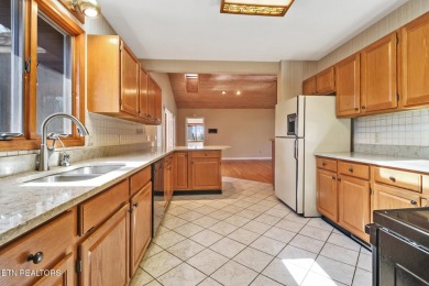 Looking for a warm, inviting home with a seasonal view of the on Druid Hills Golf Club in Tennessee - for sale on GolfHomes.com, golf home, golf lot
