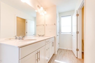 Welcome to this stunning and spacious end-unit home, built in on Seven Bridges Golf Club in Illinois - for sale on GolfHomes.com, golf home, golf lot