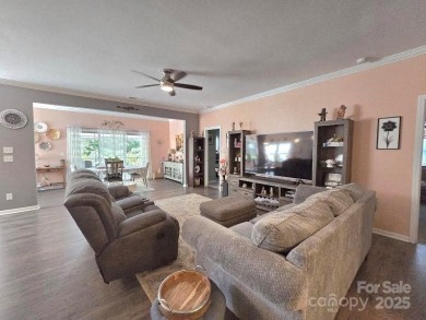 Beautiful, open floorplan home with an upgraded landscaped yard on Edgewater Golf Club in South Carolina - for sale on GolfHomes.com, golf home, golf lot