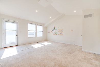 Welcome to this stunning and spacious end-unit home, built in on Seven Bridges Golf Club in Illinois - for sale on GolfHomes.com, golf home, golf lot