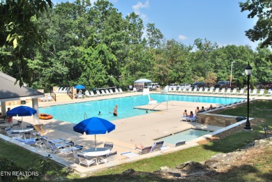 Looking for a warm, inviting home with a seasonal view of the on Druid Hills Golf Club in Tennessee - for sale on GolfHomes.com, golf home, golf lot