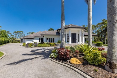 Nestled within the exclusive gated community of the Oaks Club in on The Oaks Club in Florida - for sale on GolfHomes.com, golf home, golf lot