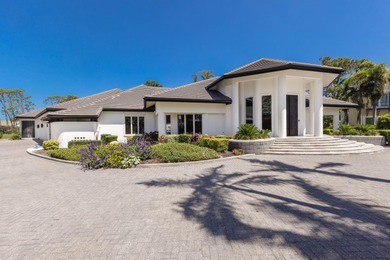 Nestled within the exclusive gated community of the Oaks Club in on The Oaks Club in Florida - for sale on GolfHomes.com, golf home, golf lot