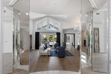 Nestled within the exclusive gated community of the Oaks Club in on The Oaks Club in Florida - for sale on GolfHomes.com, golf home, golf lot