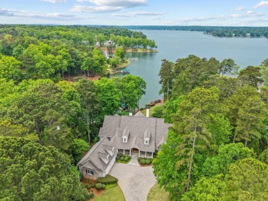 BEAUTIFUL CUSTOM HOME OFFERING UNOBSTRUCTED LAKE AND SUNSET on Reynolds Lake Oconee - The Oconee in Georgia - for sale on GolfHomes.com, golf home, golf lot