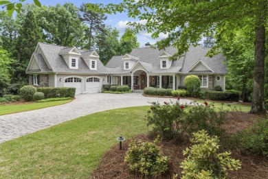 BEAUTIFUL CUSTOM HOME OFFERING UNOBSTRUCTED LAKE AND SUNSET on Reynolds Lake Oconee - The Oconee in Georgia - for sale on GolfHomes.com, golf home, golf lot