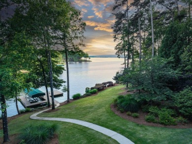 BEAUTIFUL CUSTOM HOME OFFERING UNOBSTRUCTED LAKE AND SUNSET on Reynolds Lake Oconee - The Oconee in Georgia - for sale on GolfHomes.com, golf home, golf lot
