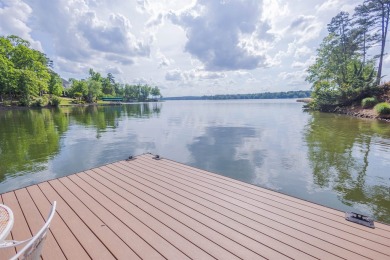 BEAUTIFUL CUSTOM HOME OFFERING UNOBSTRUCTED LAKE AND SUNSET on Reynolds Lake Oconee - The Oconee in Georgia - for sale on GolfHomes.com, golf home, golf lot