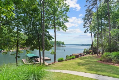 BEAUTIFUL CUSTOM HOME OFFERING UNOBSTRUCTED LAKE AND SUNSET on Reynolds Lake Oconee - The Oconee in Georgia - for sale on GolfHomes.com, golf home, golf lot