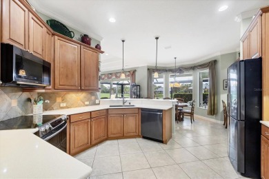 Former Model Home with Exceptional Upgrades and Panoramic Golf on Pelican Pointe Golf and Country Club in Florida - for sale on GolfHomes.com, golf home, golf lot