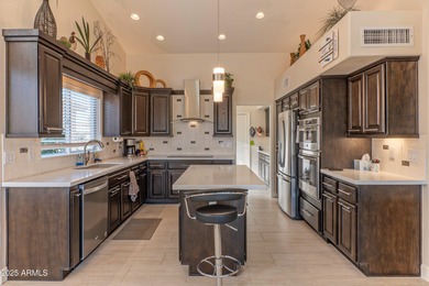 Enjoy the sweeping views of EN #14 green, #15 tee box, water & on Eagles Nest at Pebble Creek in Arizona - for sale on GolfHomes.com, golf home, golf lot