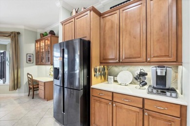 Former Model Home with Exceptional Upgrades and Panoramic Golf on Pelican Pointe Golf and Country Club in Florida - for sale on GolfHomes.com, golf home, golf lot