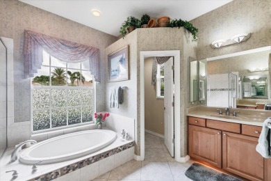 Former Model Home with Exceptional Upgrades and Panoramic Golf on Pelican Pointe Golf and Country Club in Florida - for sale on GolfHomes.com, golf home, golf lot