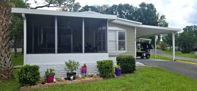 Remodeled, Move-In Ready Home with Golf Cart Included - Enjoy on Rolling Greens Executive Golf Community in Florida - for sale on GolfHomes.com, golf home, golf lot