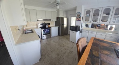 Remodeled, Move-In Ready Home with Golf Cart Included - Enjoy on Rolling Greens Executive Golf Community in Florida - for sale on GolfHomes.com, golf home, golf lot
