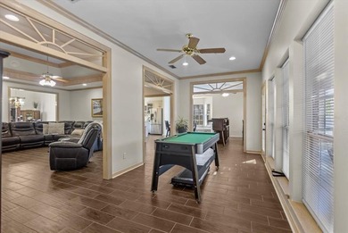 Discover this exceptional 3 or 4 bedroom, 3.5 bathroom gem on Hide-A-Way Lake Golf Course in Texas - for sale on GolfHomes.com, golf home, golf lot