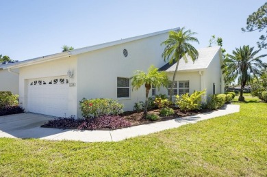 This centrally located 3 bedroom, 2 bath villa on Palm Aire Golf on University Park Country Club in Florida - for sale on GolfHomes.com, golf home, golf lot