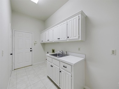 Discover this low-maintenance custom home in the peaceful on Bent Tree Golf Club in Texas - for sale on GolfHomes.com, golf home, golf lot