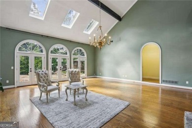 Tucked in Atlanta Country Club's quiet interior, this stately on Atlanta Country Club in Georgia - for sale on GolfHomes.com, golf home, golf lot
