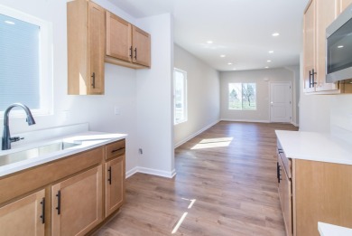 New construction townhome at the Emerald Hills Golf Course. The on Alwyn Downs Golf Club in Michigan - for sale on GolfHomes.com, golf home, golf lot