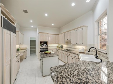 Discover this low-maintenance custom home in the peaceful on Bent Tree Golf Club in Texas - for sale on GolfHomes.com, golf home, golf lot