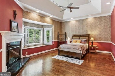 Tucked in Atlanta Country Club's quiet interior, this stately on Atlanta Country Club in Georgia - for sale on GolfHomes.com, golf home, golf lot