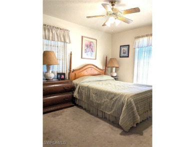 Welcome to this rarely available 3 bedroom, 2 bath, 2 car garage on Myerlee Country Club in Florida - for sale on GolfHomes.com, golf home, golf lot