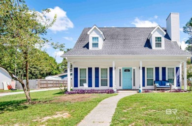 Discover this charming cottage with impressive curb appeal on Lake Forest Yacht and Country Club in Alabama - for sale on GolfHomes.com, golf home, golf lot