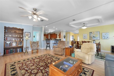This amazing TRIPLE-wide Palm Harbor home is situated on a on Maple Leaf Golf and Country Club in Florida - for sale on GolfHomes.com, golf home, golf lot