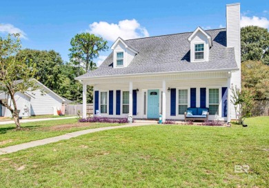 Discover this charming cottage with impressive curb appeal on Lake Forest Yacht and Country Club in Alabama - for sale on GolfHomes.com, golf home, golf lot