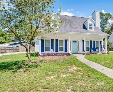 Discover this charming cottage with impressive curb appeal on Lake Forest Yacht and Country Club in Alabama - for sale on GolfHomes.com, golf home, golf lot