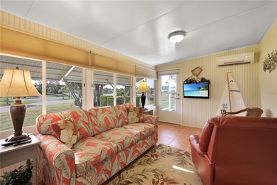 This amazing TRIPLE-wide Palm Harbor home is situated on a on Maple Leaf Golf and Country Club in Florida - for sale on GolfHomes.com, golf home, golf lot