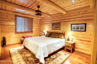 Charming Log-Sided Retreat in Prestigious White Mountain Summer on White Mountain Country Club in Arizona - for sale on GolfHomes.com, golf home, golf lot