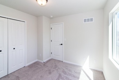 New construction townhome at the Emerald Hills Golf Course. The on Alwyn Downs Golf Club in Michigan - for sale on GolfHomes.com, golf home, golf lot