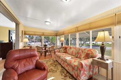 This amazing TRIPLE-wide Palm Harbor home is situated on a on Maple Leaf Golf and Country Club in Florida - for sale on GolfHomes.com, golf home, golf lot