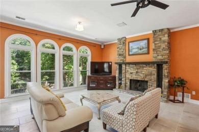 Tucked in Atlanta Country Club's quiet interior, this stately on Atlanta Country Club in Georgia - for sale on GolfHomes.com, golf home, golf lot