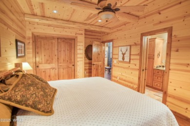 Charming Log-Sided Retreat in Prestigious White Mountain Summer on White Mountain Country Club in Arizona - for sale on GolfHomes.com, golf home, golf lot