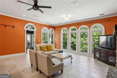 Tucked in Atlanta Country Club's quiet interior, this stately on Atlanta Country Club in Georgia - for sale on GolfHomes.com, golf home, golf lot