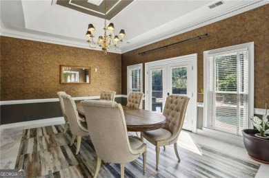 Tucked in Atlanta Country Club's quiet interior, this stately on Atlanta Country Club in Georgia - for sale on GolfHomes.com, golf home, golf lot