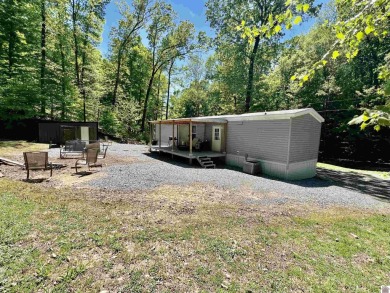 Are you in search of a budget-friendly lake retreat? If yes on Boots Randolph Golf Course in Kentucky - for sale on GolfHomes.com, golf home, golf lot