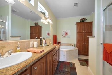 This amazing TRIPLE-wide Palm Harbor home is situated on a on Maple Leaf Golf and Country Club in Florida - for sale on GolfHomes.com, golf home, golf lot