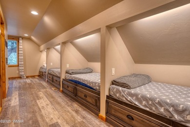 Charming Log-Sided Retreat in Prestigious White Mountain Summer on White Mountain Country Club in Arizona - for sale on GolfHomes.com, golf home, golf lot
