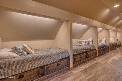 Charming Log-Sided Retreat in Prestigious White Mountain Summer on White Mountain Country Club in Arizona - for sale on GolfHomes.com, golf home, golf lot