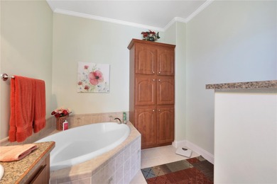 This amazing TRIPLE-wide Palm Harbor home is situated on a on Maple Leaf Golf and Country Club in Florida - for sale on GolfHomes.com, golf home, golf lot