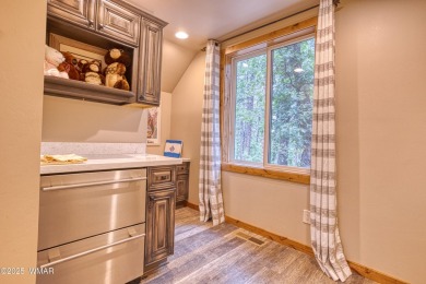 Charming Log-Sided Retreat in Prestigious White Mountain Summer on White Mountain Country Club in Arizona - for sale on GolfHomes.com, golf home, golf lot
