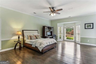 Tucked in Atlanta Country Club's quiet interior, this stately on Atlanta Country Club in Georgia - for sale on GolfHomes.com, golf home, golf lot