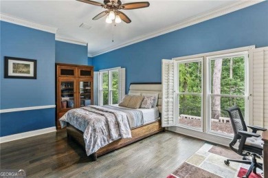Tucked in Atlanta Country Club's quiet interior, this stately on Atlanta Country Club in Georgia - for sale on GolfHomes.com, golf home, golf lot