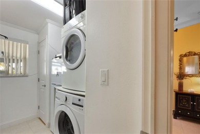 This amazing TRIPLE-wide Palm Harbor home is situated on a on Maple Leaf Golf and Country Club in Florida - for sale on GolfHomes.com, golf home, golf lot