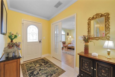 This amazing TRIPLE-wide Palm Harbor home is situated on a on Maple Leaf Golf and Country Club in Florida - for sale on GolfHomes.com, golf home, golf lot