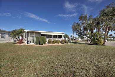 This amazing TRIPLE-wide Palm Harbor home is situated on a on Maple Leaf Golf and Country Club in Florida - for sale on GolfHomes.com, golf home, golf lot